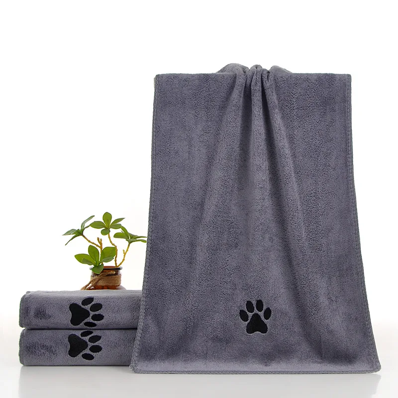 Grey paw-print pet towel; one towel supplied despite multiple styling examples