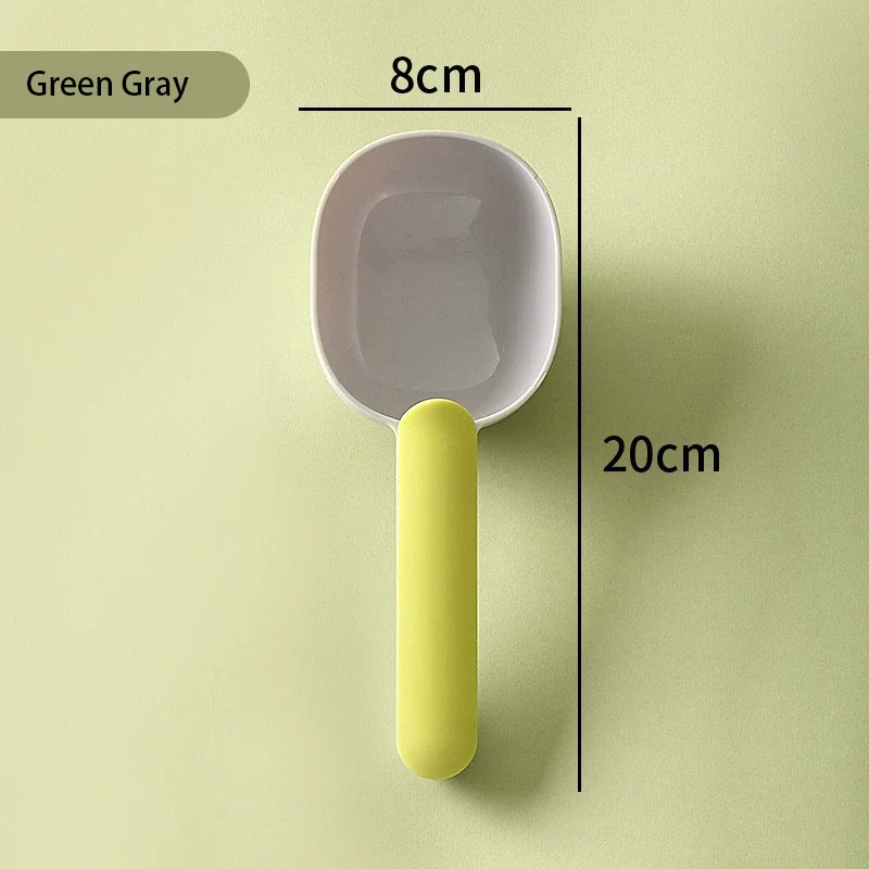 Grey pet food scoop with green bag-clip handle, 20 cm long